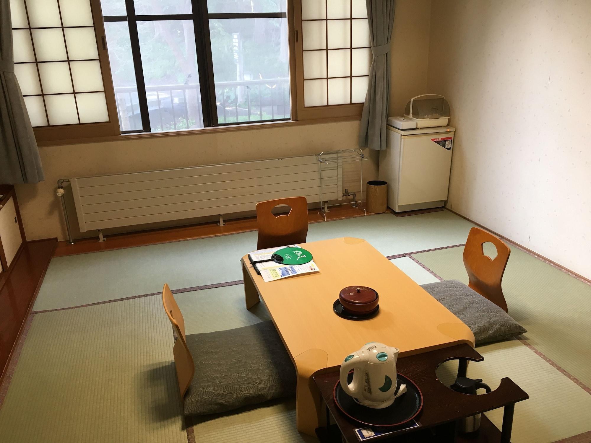 Marukoma Onsen Ryokan Титосе Экстерьер фото