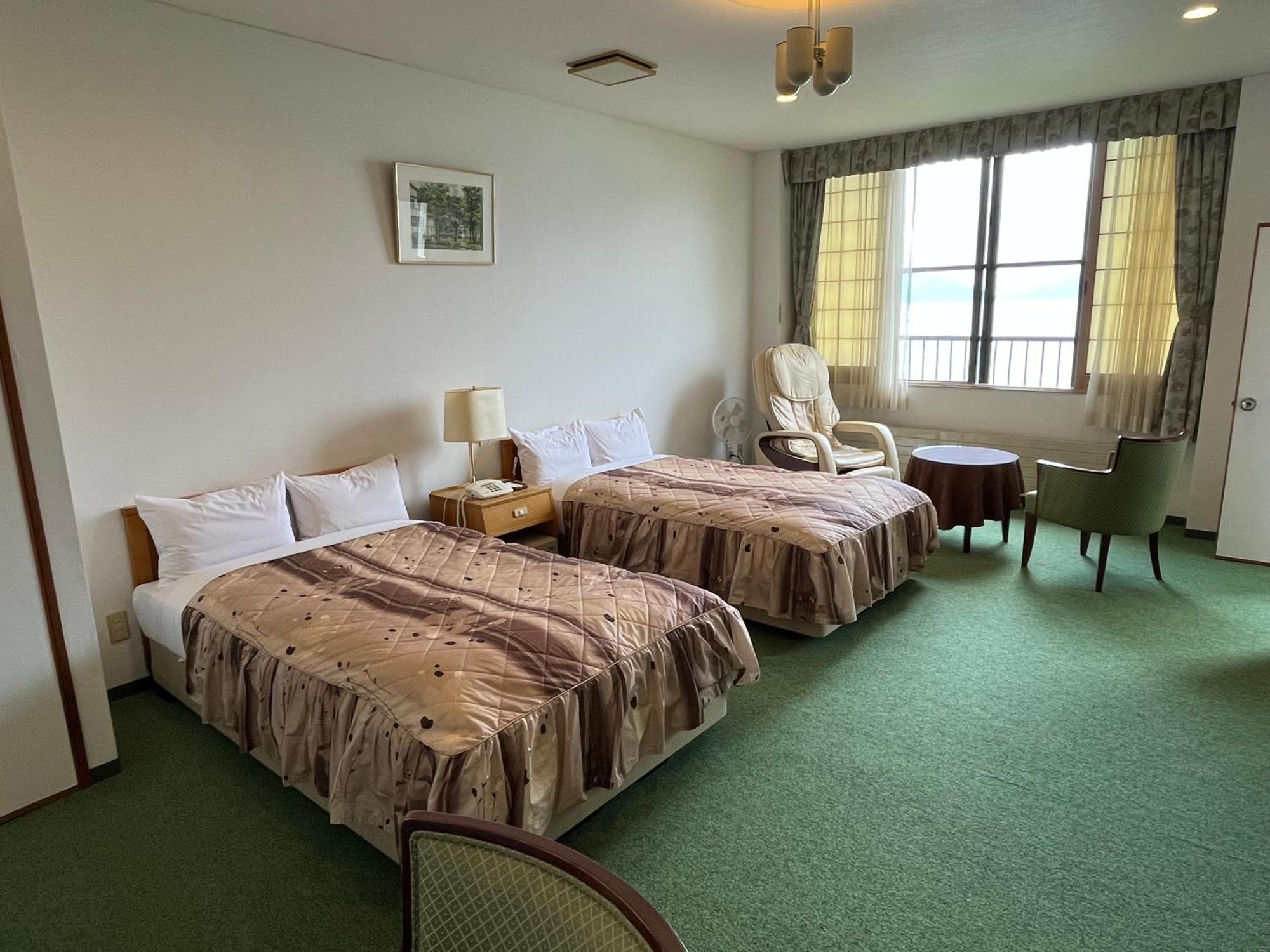 Marukoma Onsen Ryokan Титосе Экстерьер фото